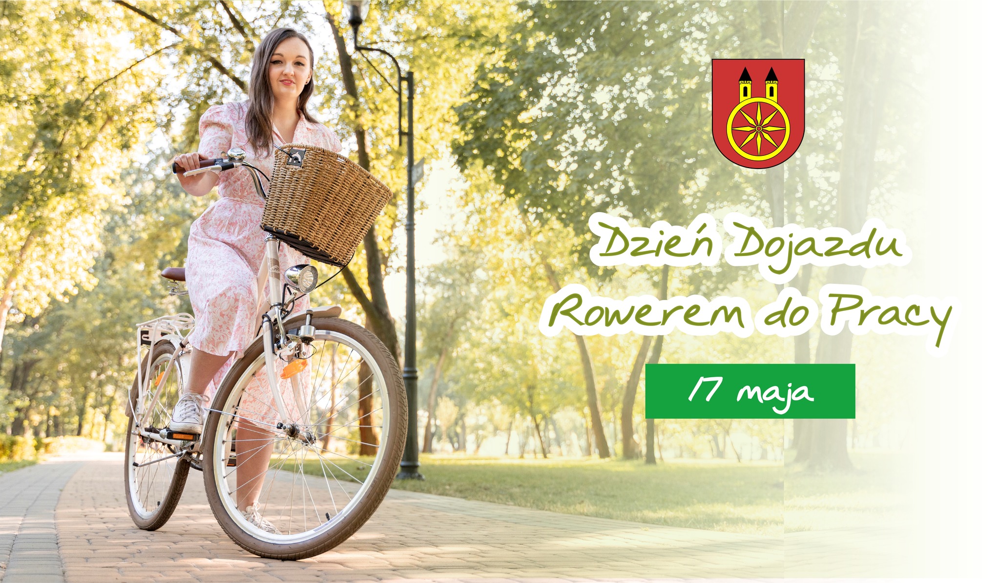 Plansza z napisem 17 MAJA Światowy Dzień Dojazdu do Pracy Rowerem, na planszy kobieta na rowerze