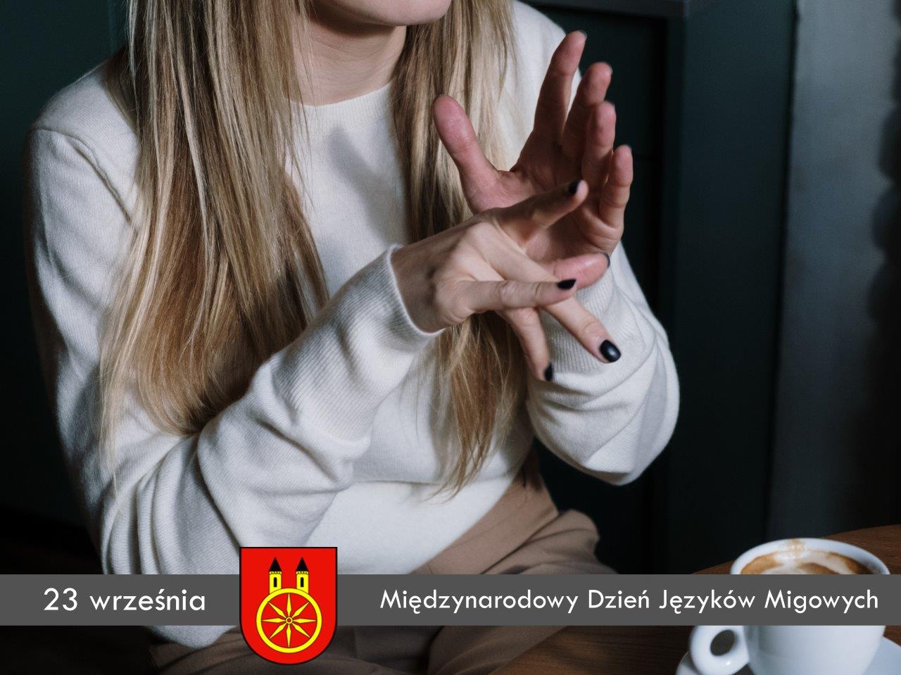 Plansza 23 września Międzynarodowy Dzień Języków Migowych, tekst pod planszą