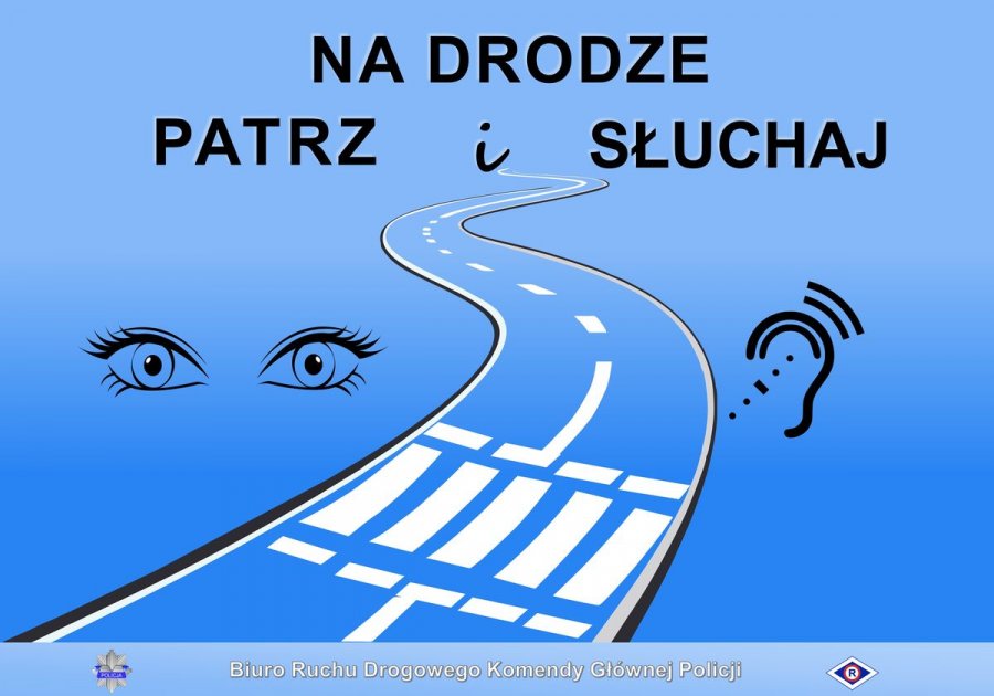 Napis na niebieskim tle Na Drodze – Patrz i Słuchaj, rysunki kręta droga oraz uszy i oczy.
