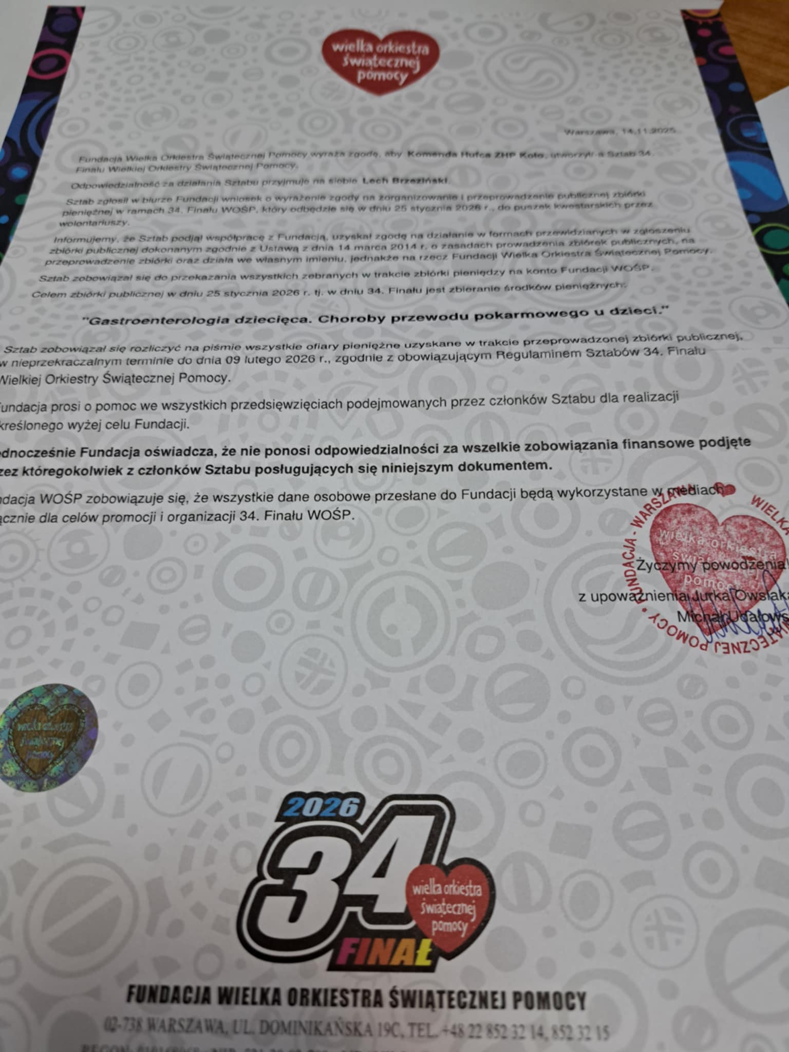 Zdjęcie oficjalnego pisma Wielkiej orkiestry Świątecznej Pomocy z logotypem 34. Finału WOŚP.