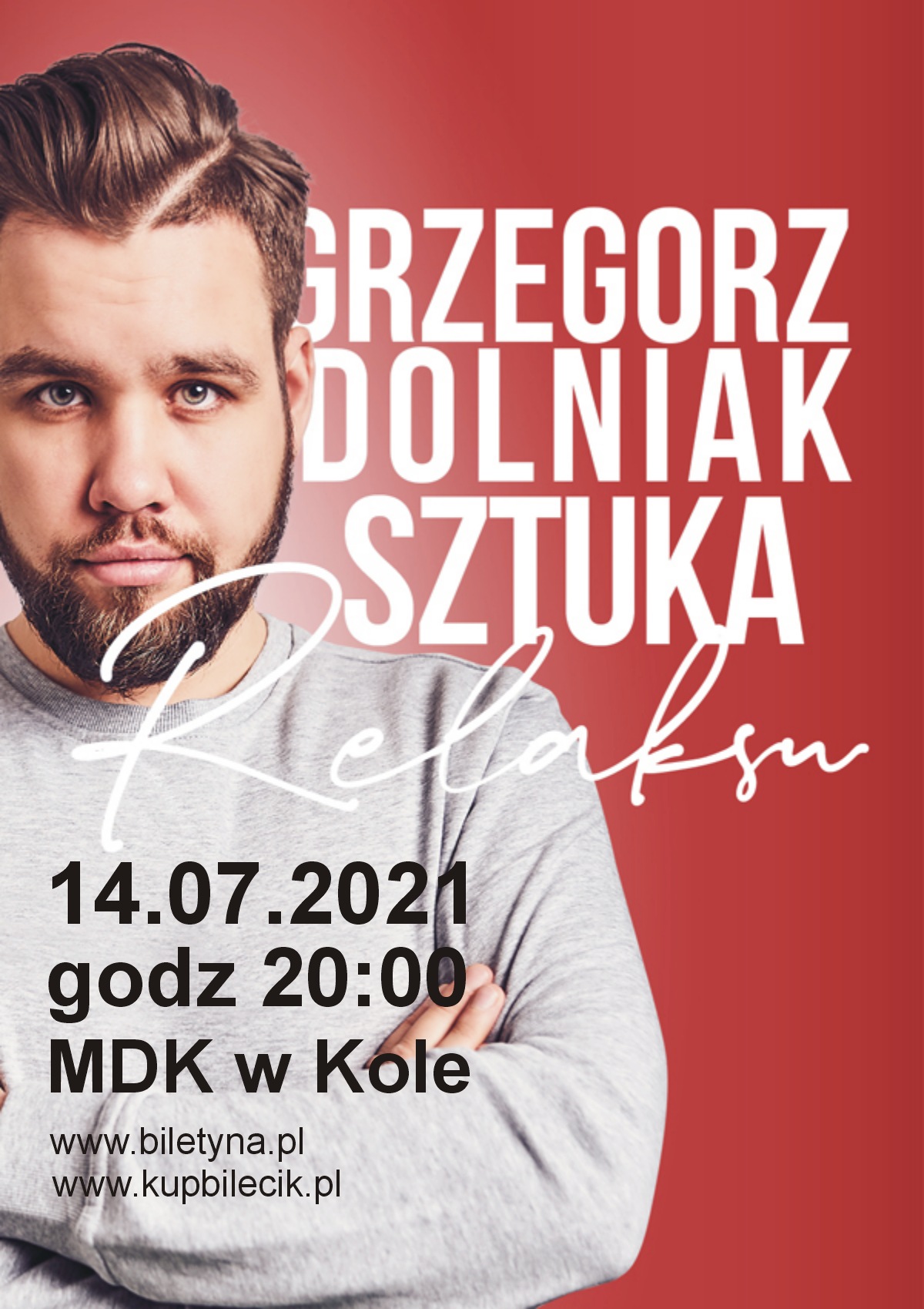 Zdjęcie Grzegorza Dolniaka, tekst pod plakatem.
